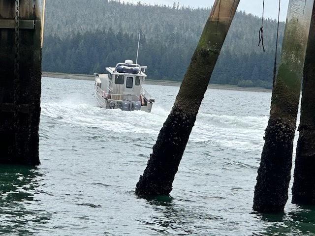 Huck Finn Seth’s boat, Huck Finn, as he and his friends, the last of our summer’s guests , leave for the four-hour trip to Juneau.