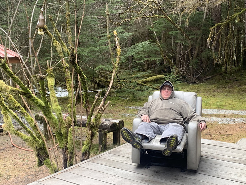 Husband relaxing on the deck on a spring day